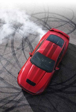 Overhead view of a 2024 Ford Mustang® model with tire tracks on pavement | Casa Ford in El Paso TX