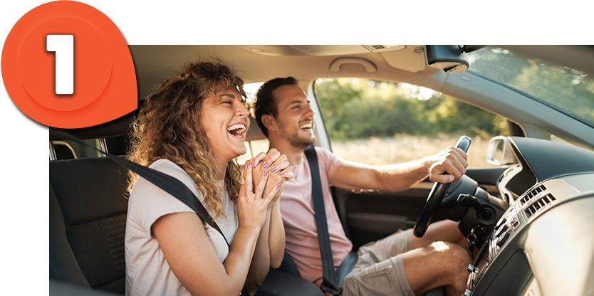 A couple driving away worry free